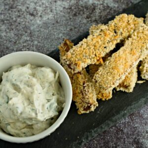 tofu fish sticks with panko bread crumb and a bowl of sauce.