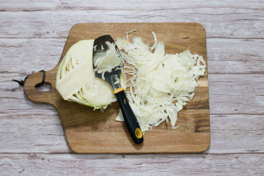 how to use a cheese slicer to shred the cbbage.